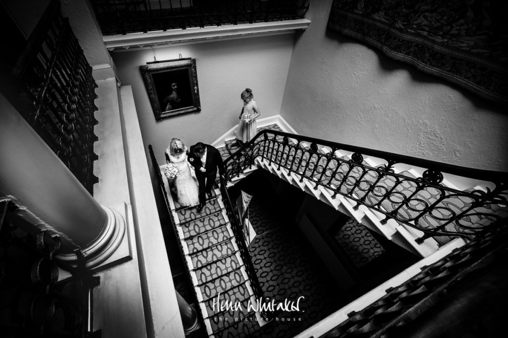 Documentary wedding photographer Storrs Hall stairs Lake District