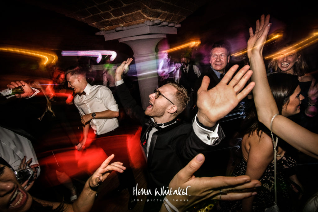 Documentary wedding photographer Matfen Hall Northumberland dancing