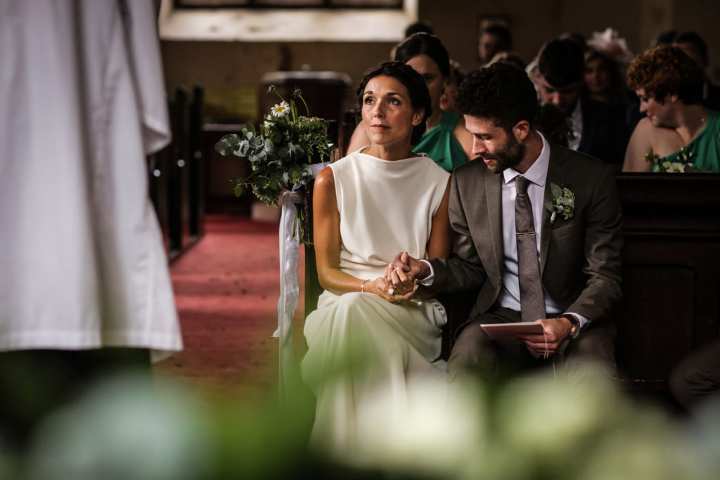 lake district documentary wedding photographer The Rowley Estates couple in church