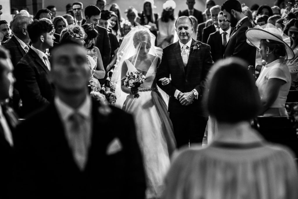 lake district documentary wedding photographer father walking his daughter up the aisle