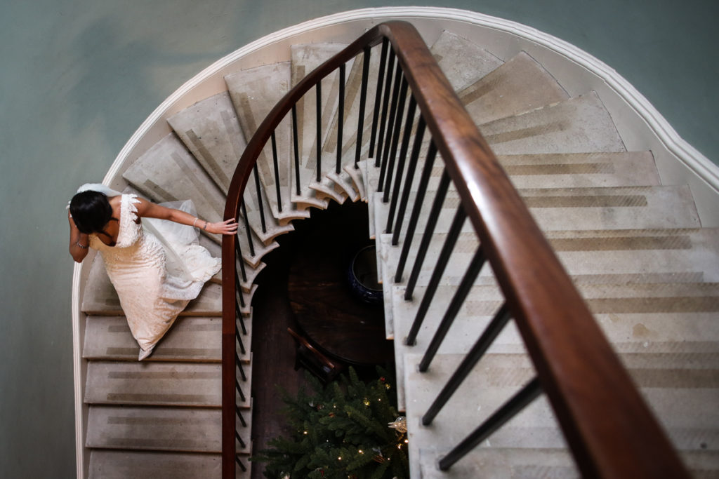 lake district documentary wedding photographer Longlands bride on the stairs