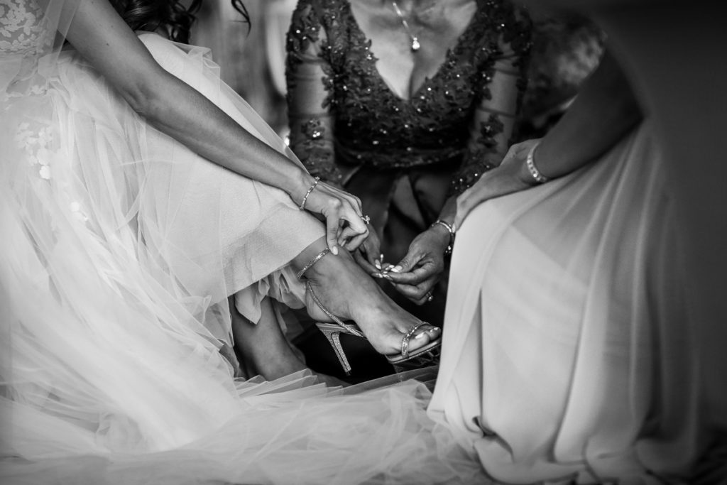 lake district documentary wedding photographer brides shoes in black and white