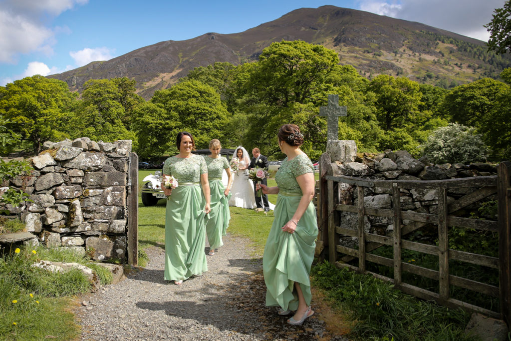 lake district documentary wedding photographer arrival of the bride and bridesmaids in the mountains