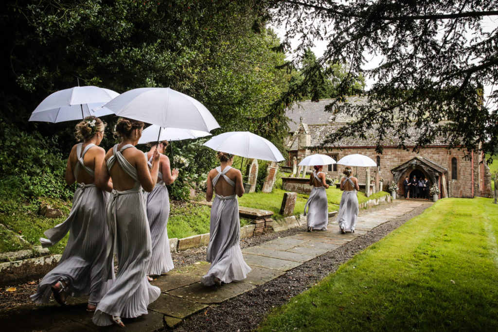 lake district documentary wedding photographer bridesmaids arriving at church