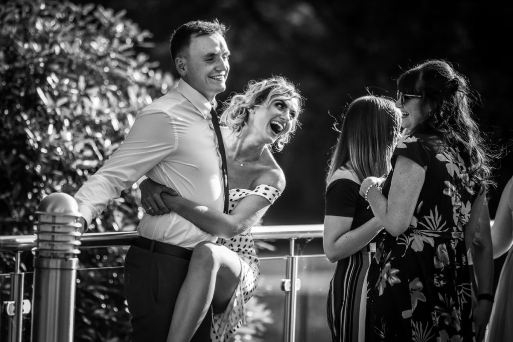 lake district documentary wedding photographer Armathwaite Hall wedding partying guests in black and white