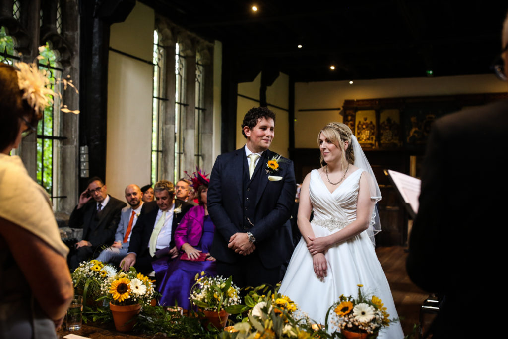 lake district documentary wedding photographer Samlesbury Hall vows laughing