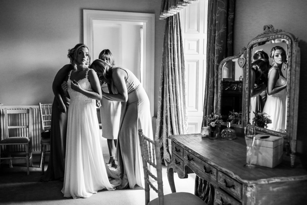 lake district documentary wedding photographer Springkell bridal prep in black and white