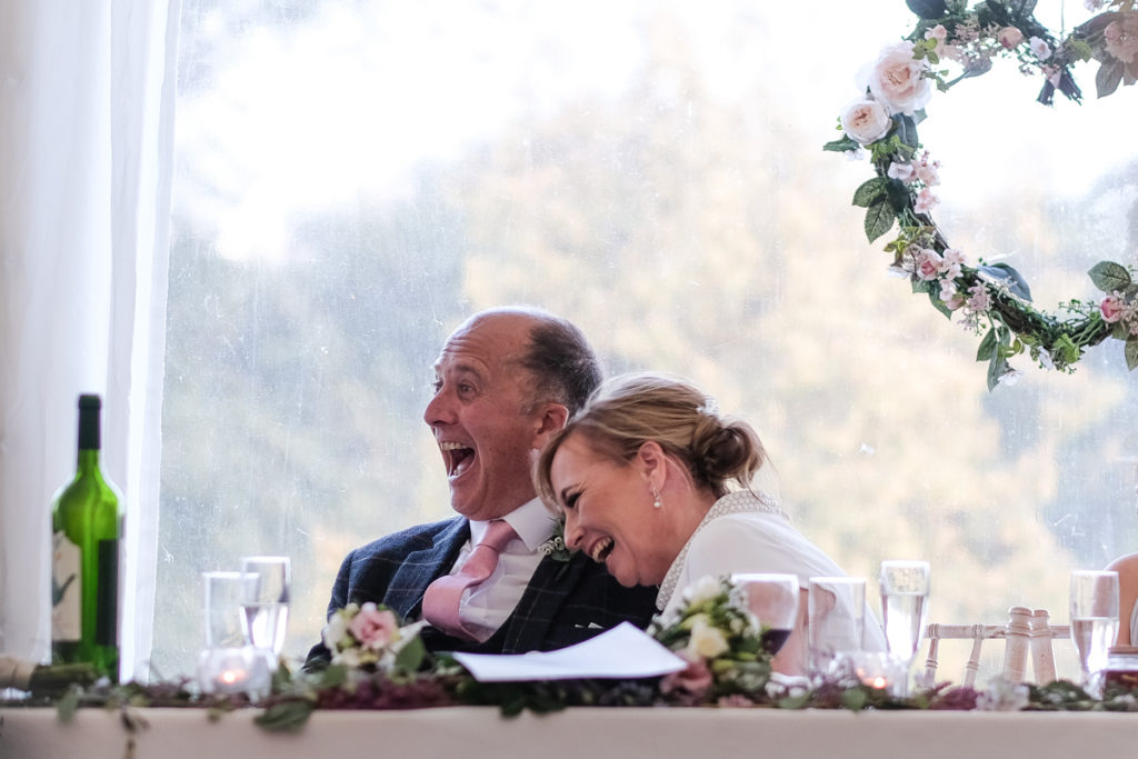 lake district documentary wedding photographer parents laughing at speeches