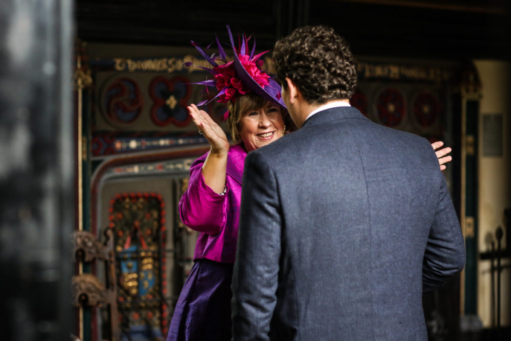 lake district documentary wedding photographer Samlesbury Hall Mother of the groom embrace