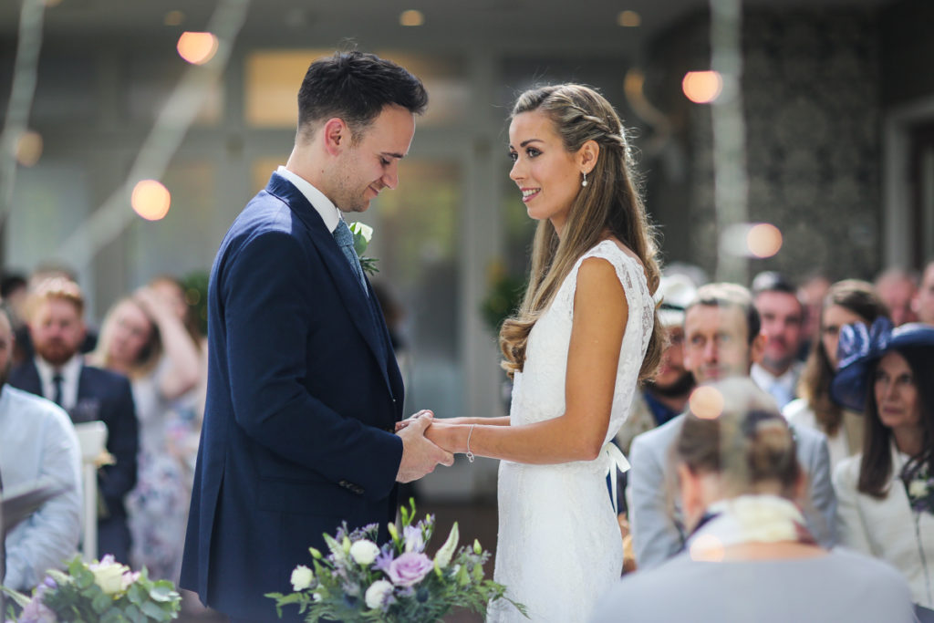 lake district documentary wedding photographer Broadoakes Windermere couple doing vows