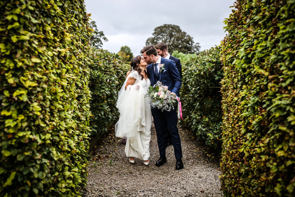 lake district documentary wedding photographer Askham hall couple kissing