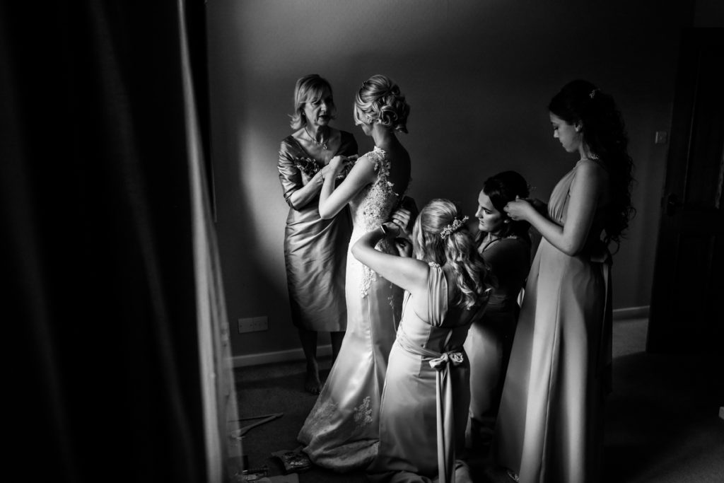 lake district documentary wedding photographer bride getting ready at home black and white