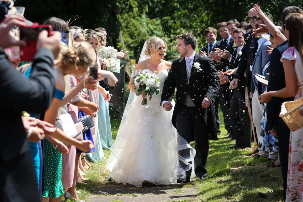 lake district documentary wedding photographer couple and confetti