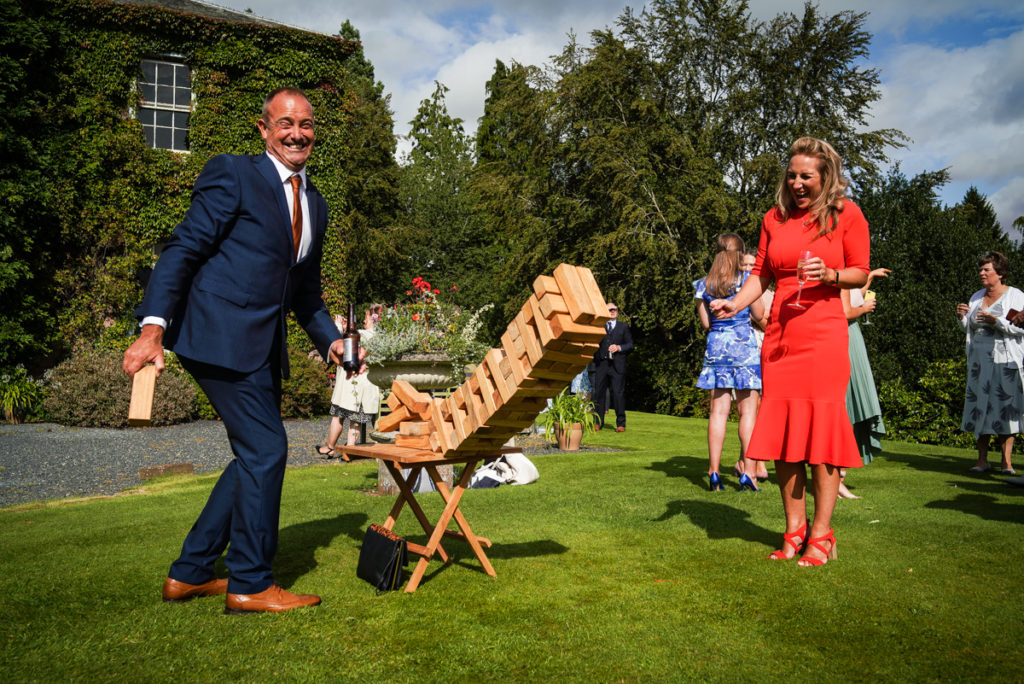 lake district documentary wedding photographer Lowhouse playing garden jenga