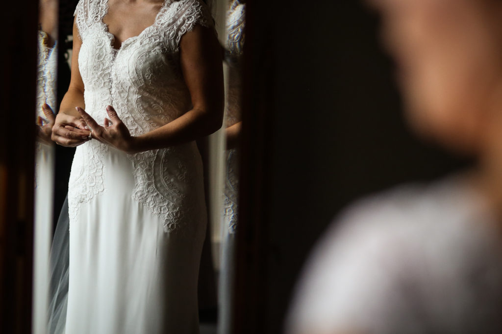 lake district documentary wedding photographer brides hands in mirror