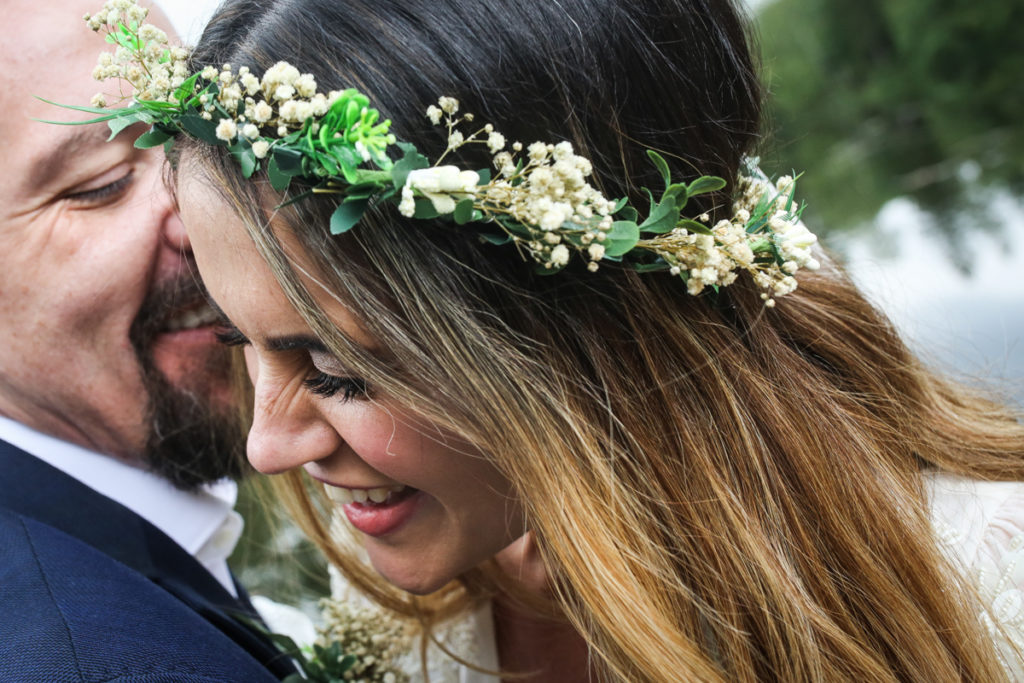 lake district documentary wedding photographer close up of couple laughing