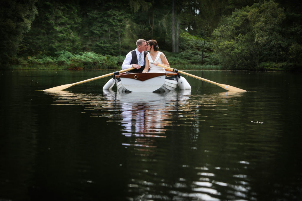 Elopement wedding photographer boat Gilpin Lake house